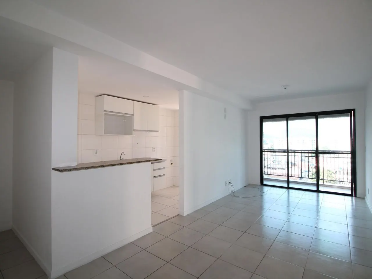 Apartamento no Mio Residencial: sala e cozinha